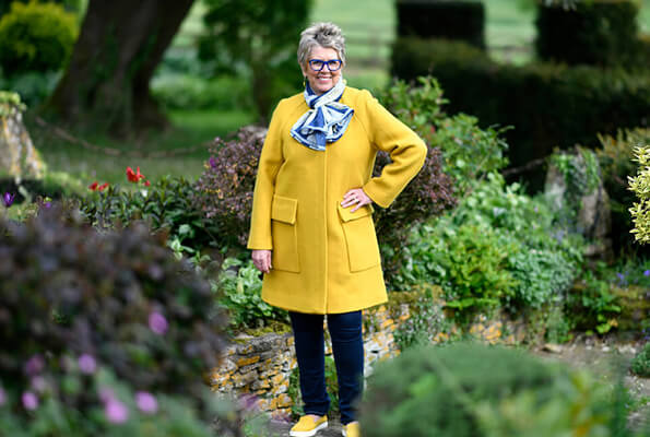 Prue wearing yellow coat from Zara