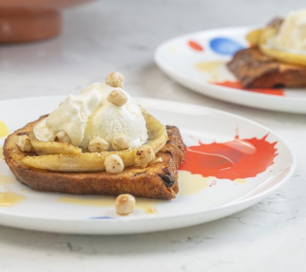 Bananas and Ice cream with brandy syrup on panettone