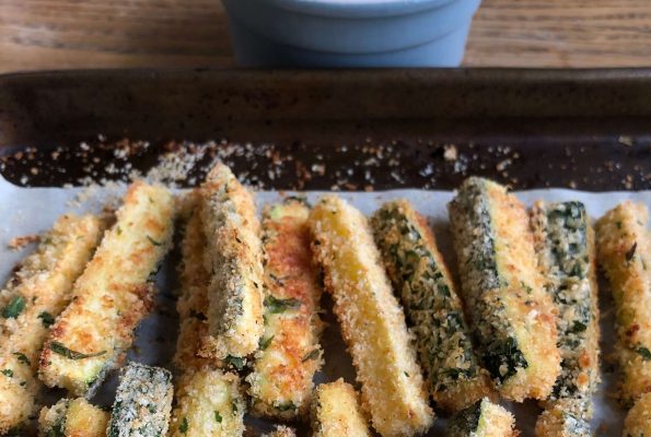 Crispy baked courgette fingers with sour cream and chive dip