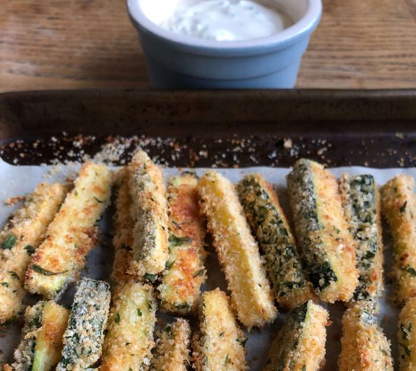 Crispy baked courgette fingers with sour cream and chive dip