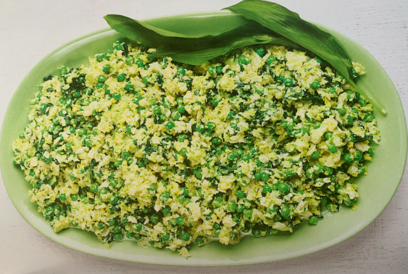 Green spinach, sprouts and frozen peas