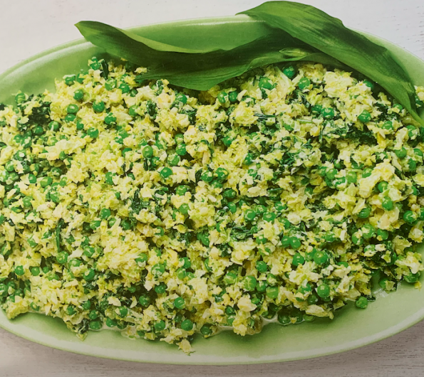 Green spinach, sprouts and frozen peas