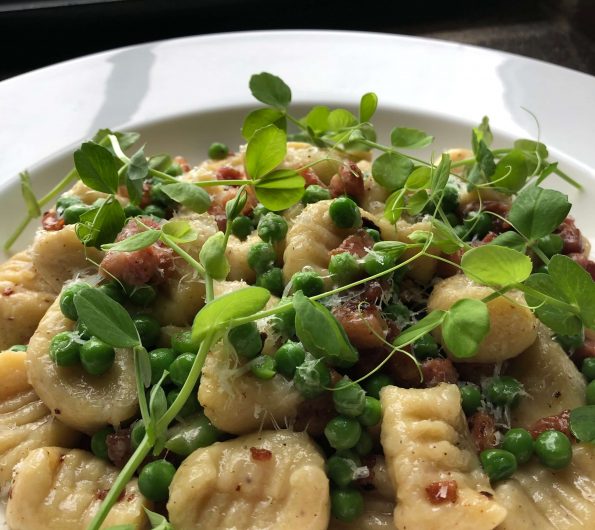 Gnocchi with peas, bacon and parmesan
